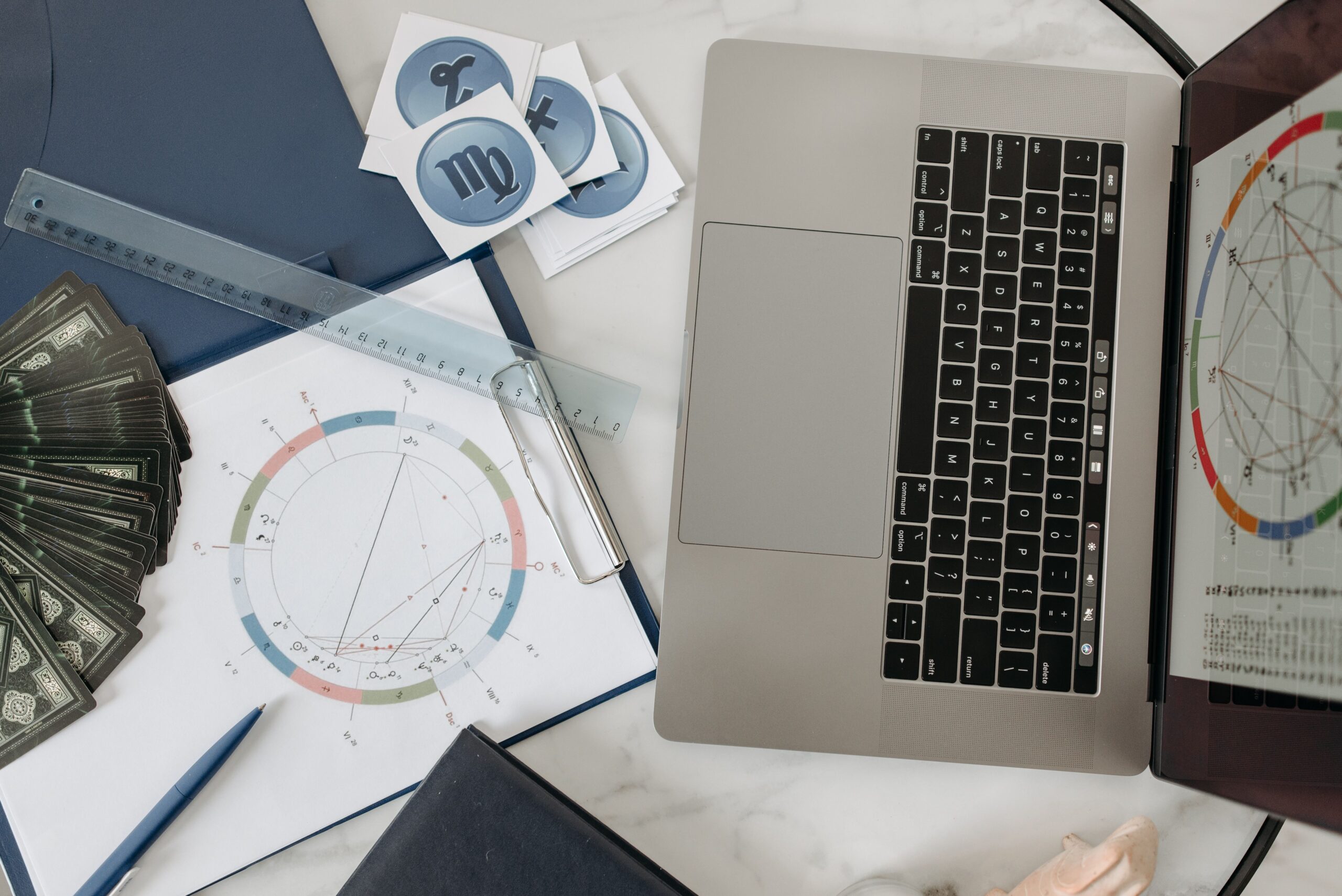 computer, astrology chart, cards, journal
